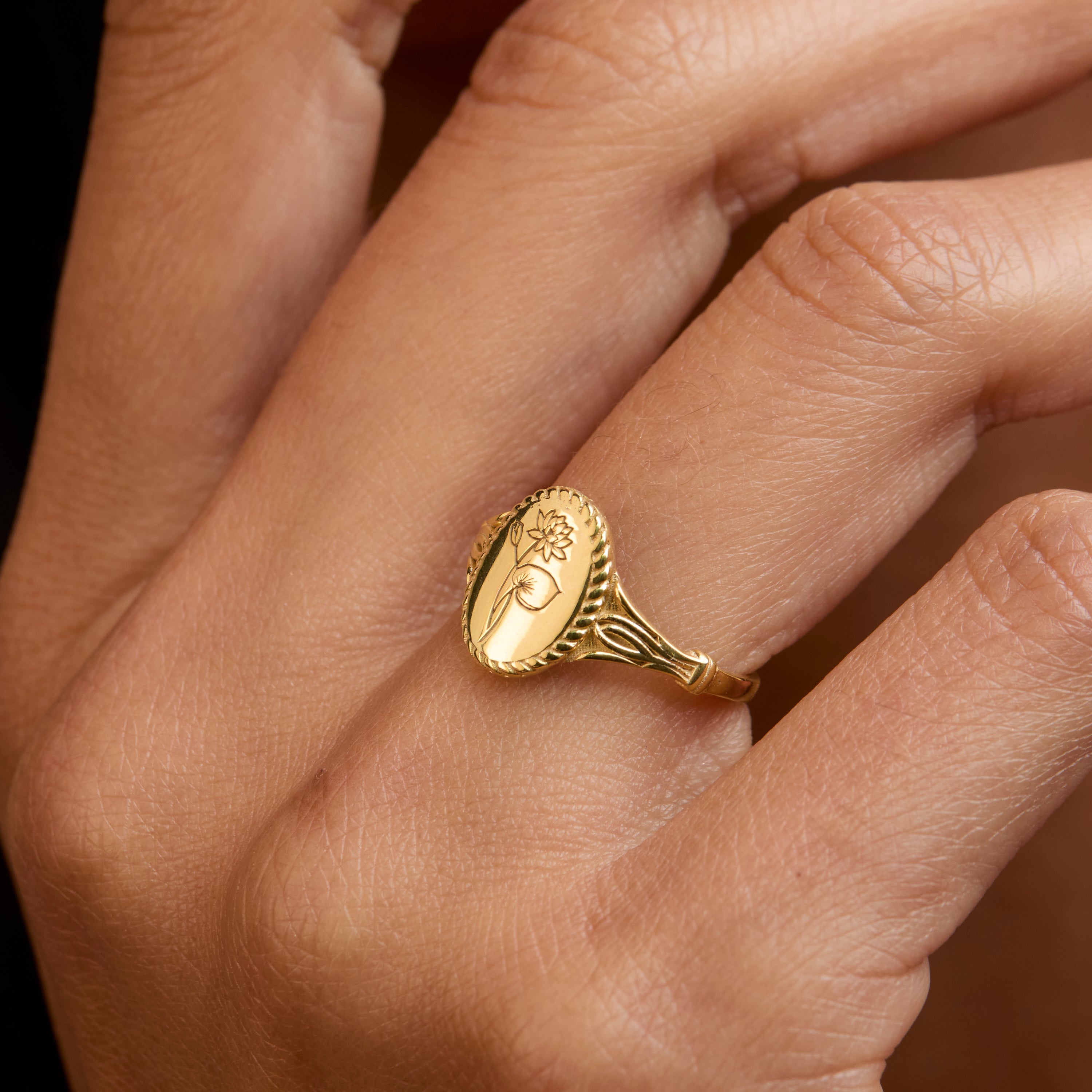 Close detail of the Birth Flower Signet Ring in 18K Gold Vermeil. Hypoallergenic, no green marks, premium handmade jewelry.