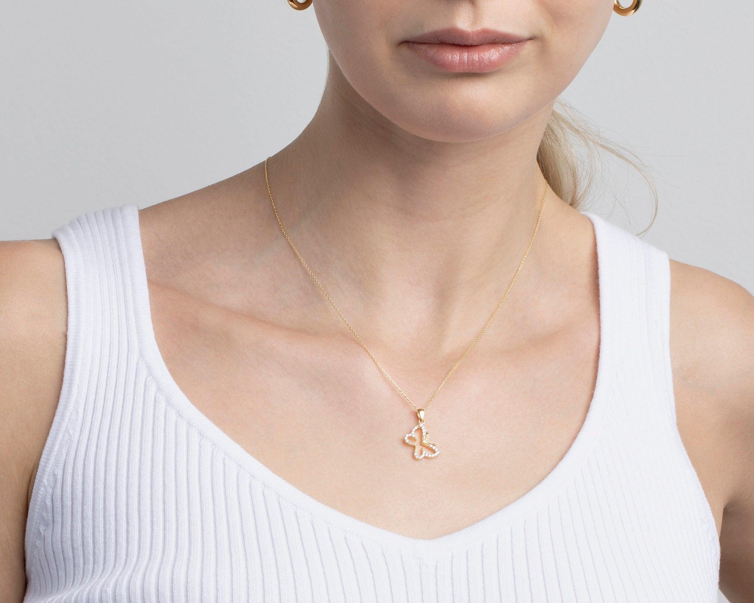 Close detail of the Gold Butterfly Necklace in 18K Gold Vermeil. Safe for sensitive skin, premium handmade jewelry.
