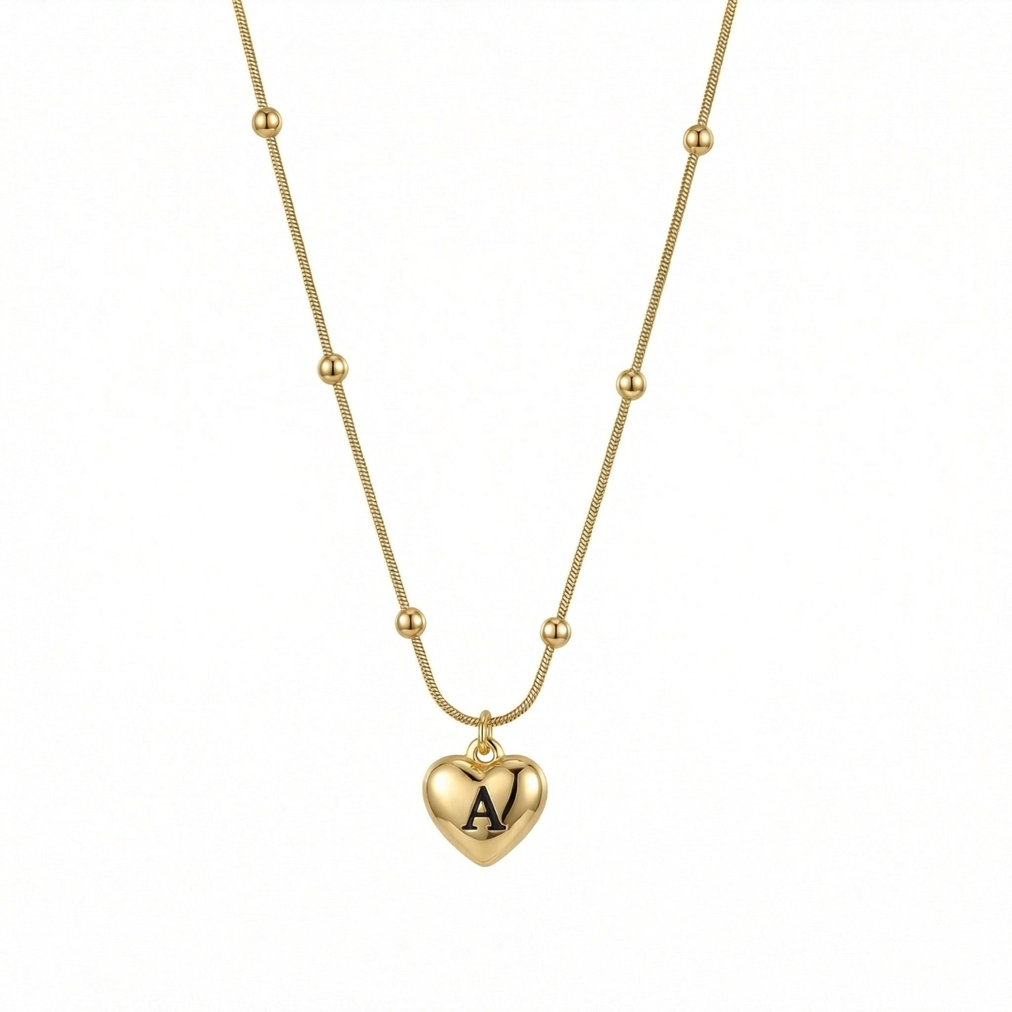 Heart Initial Engraved Necklace in Gold-Plated Steel. Tarnish-resistant, perfect for daily wear.
