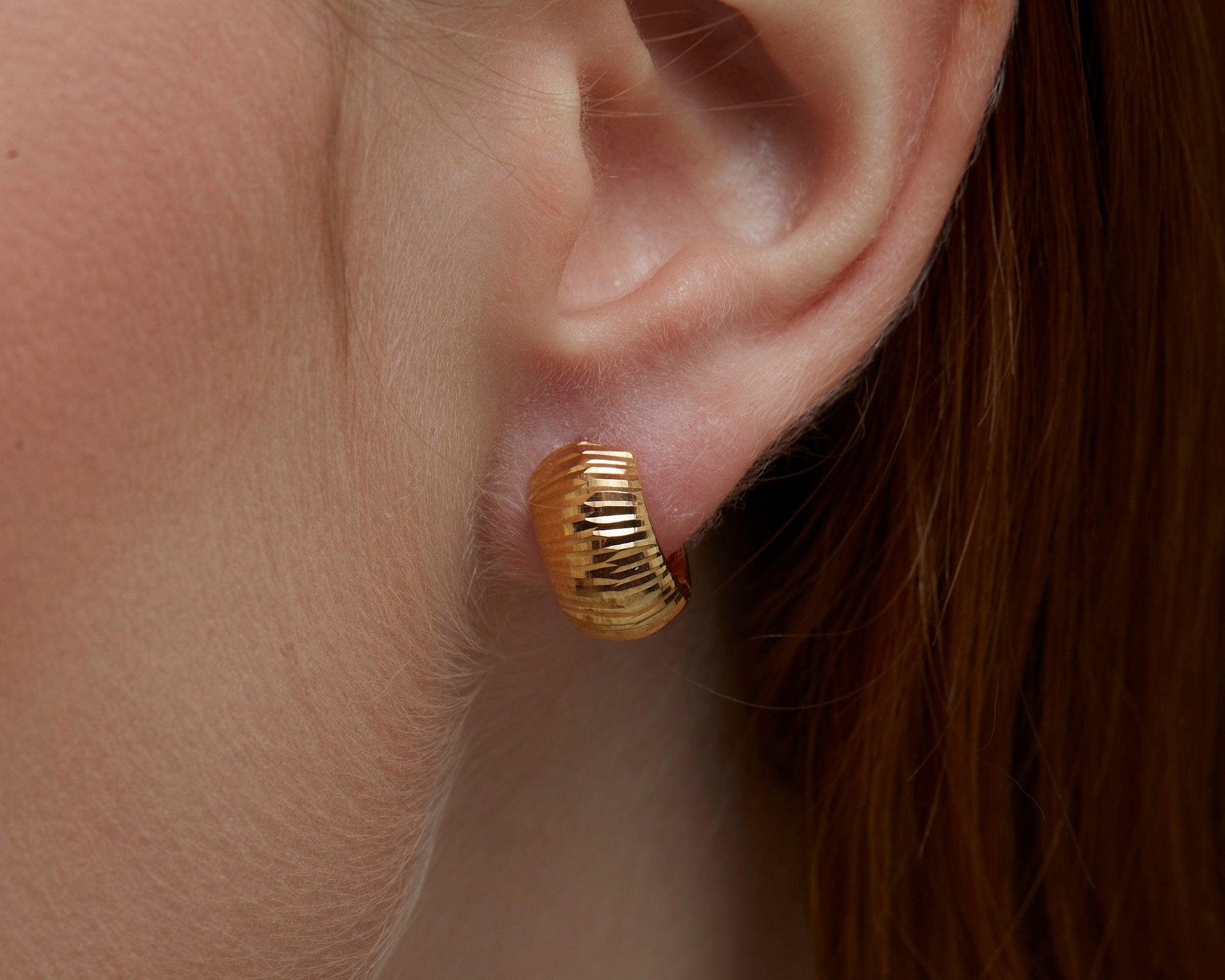Close detail of the Textured Huggie Earrings in 18K Gold Vermeil. Tarnish-resistant, premium handmade jewelry.