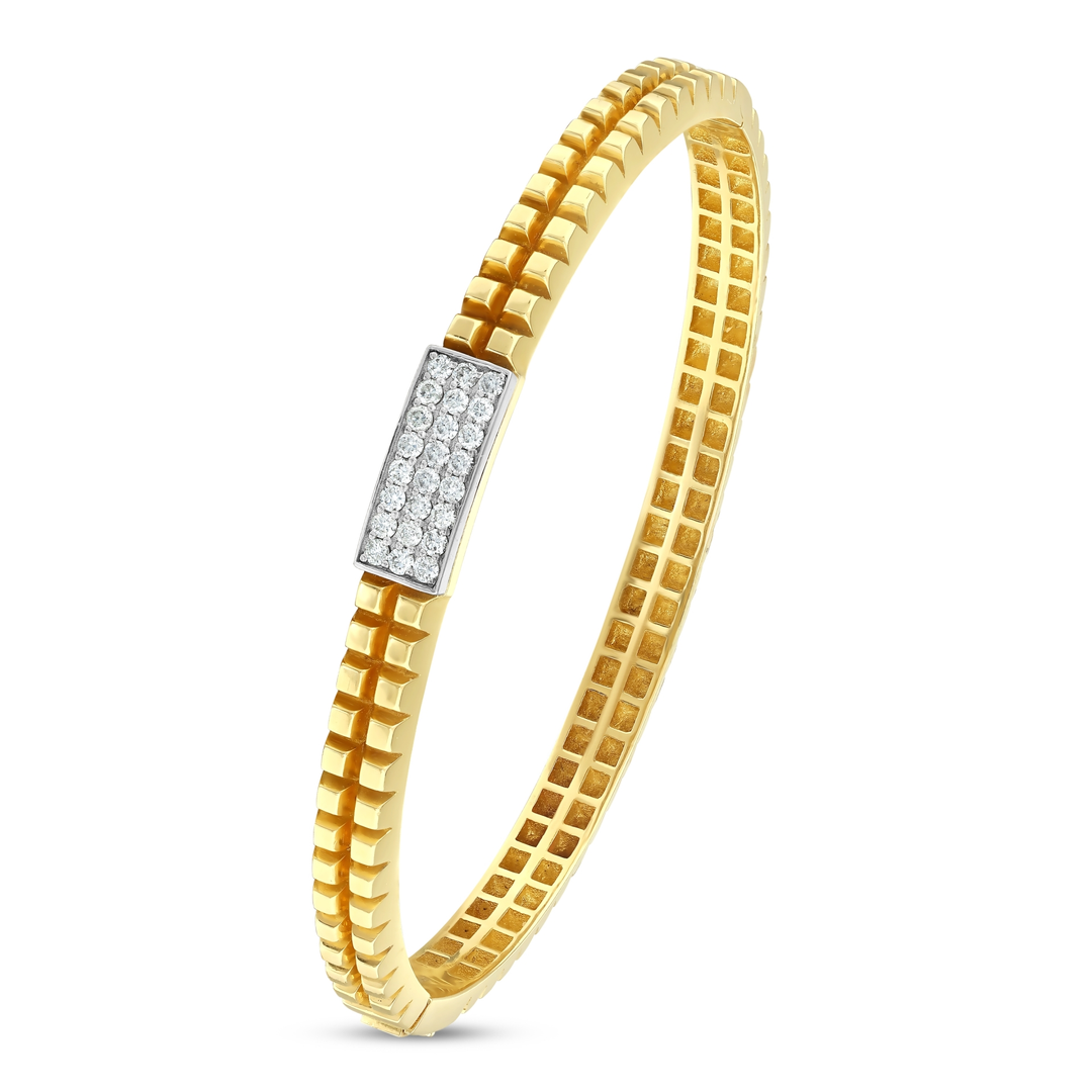14K yellow gold hinged bangle with two rows of gold blocks and a white-gold plate of natural pavé diamonds, angled view