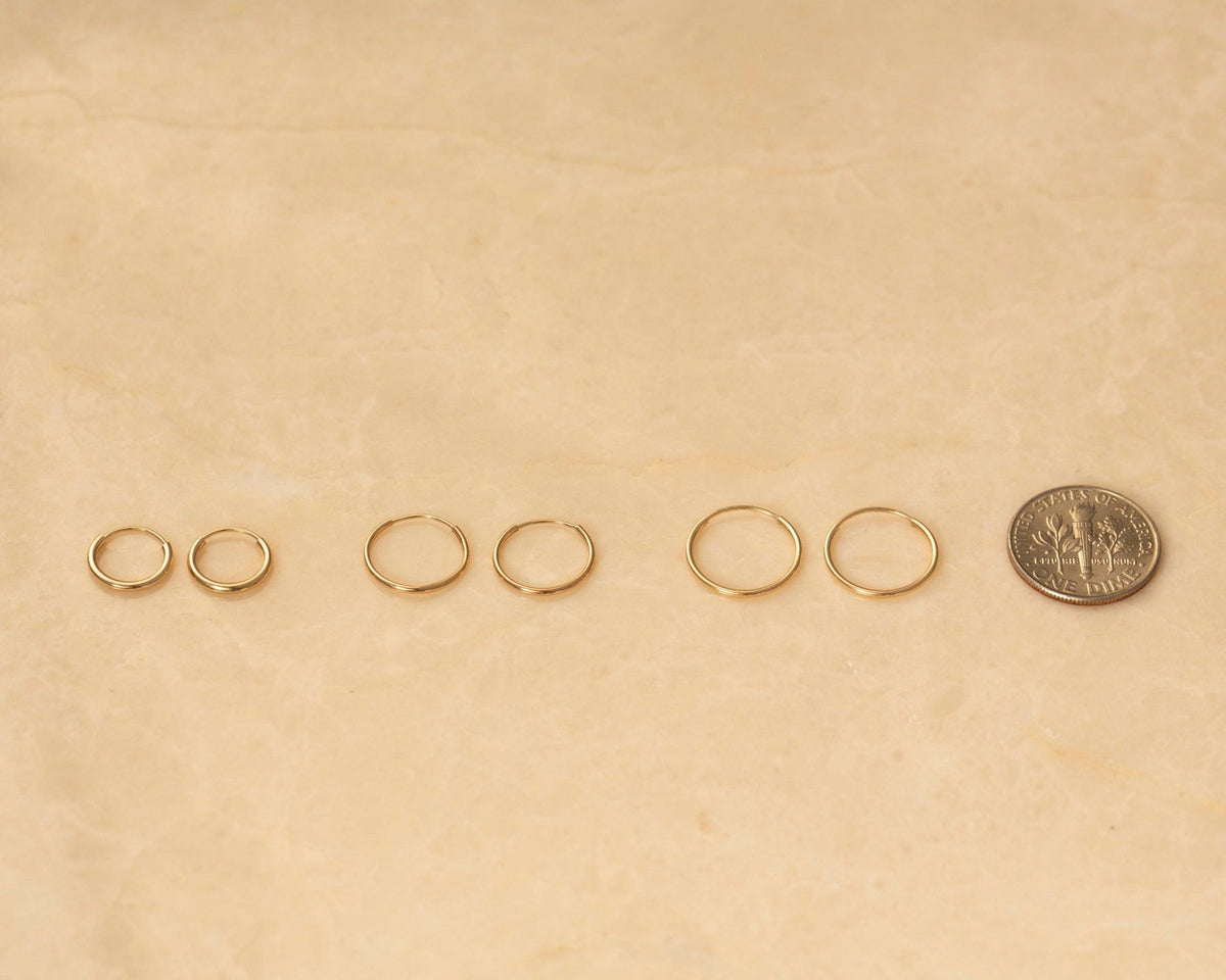 The 14K Solid Gold Endless Hoop Earrings as a daily wear gift. Hypoallergenic real gold, made for keeping.