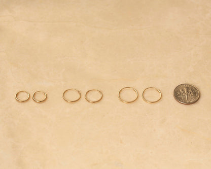 The 14K Solid Gold Endless Hoop Earrings as a daily wear gift. Hypoallergenic real gold, made for keeping.