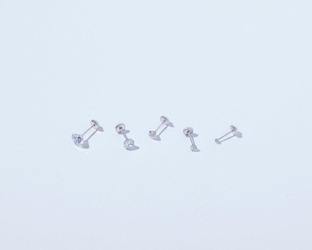 The 14K Solid White Gold Stud Earrings as a daily wear gift in 14K Solid Gold. Hypoallergenic real gold, made for keeping.