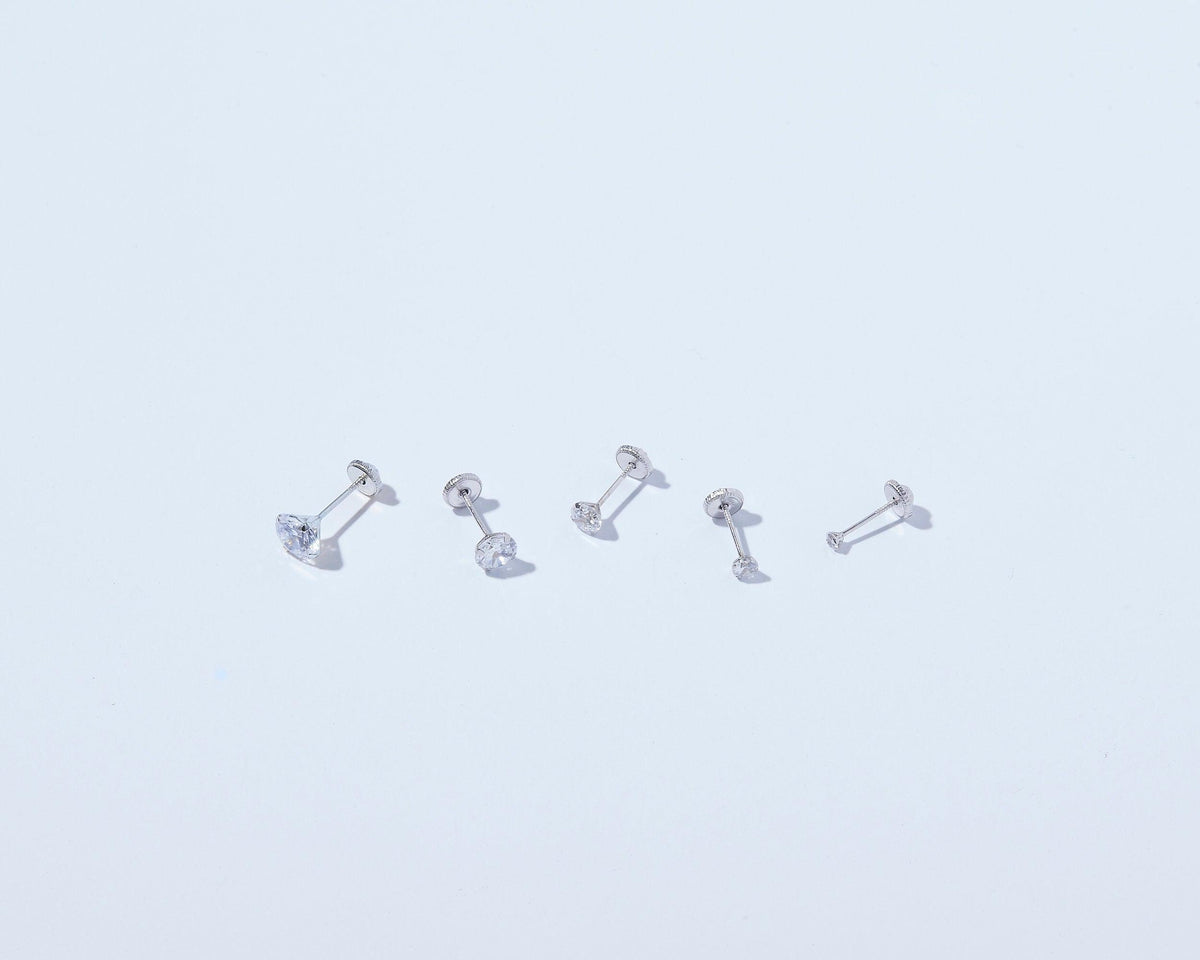 The 14K Solid White Gold Stud Earrings as a daily wear gift in 14K Solid Gold. Hypoallergenic real gold, made for keeping.