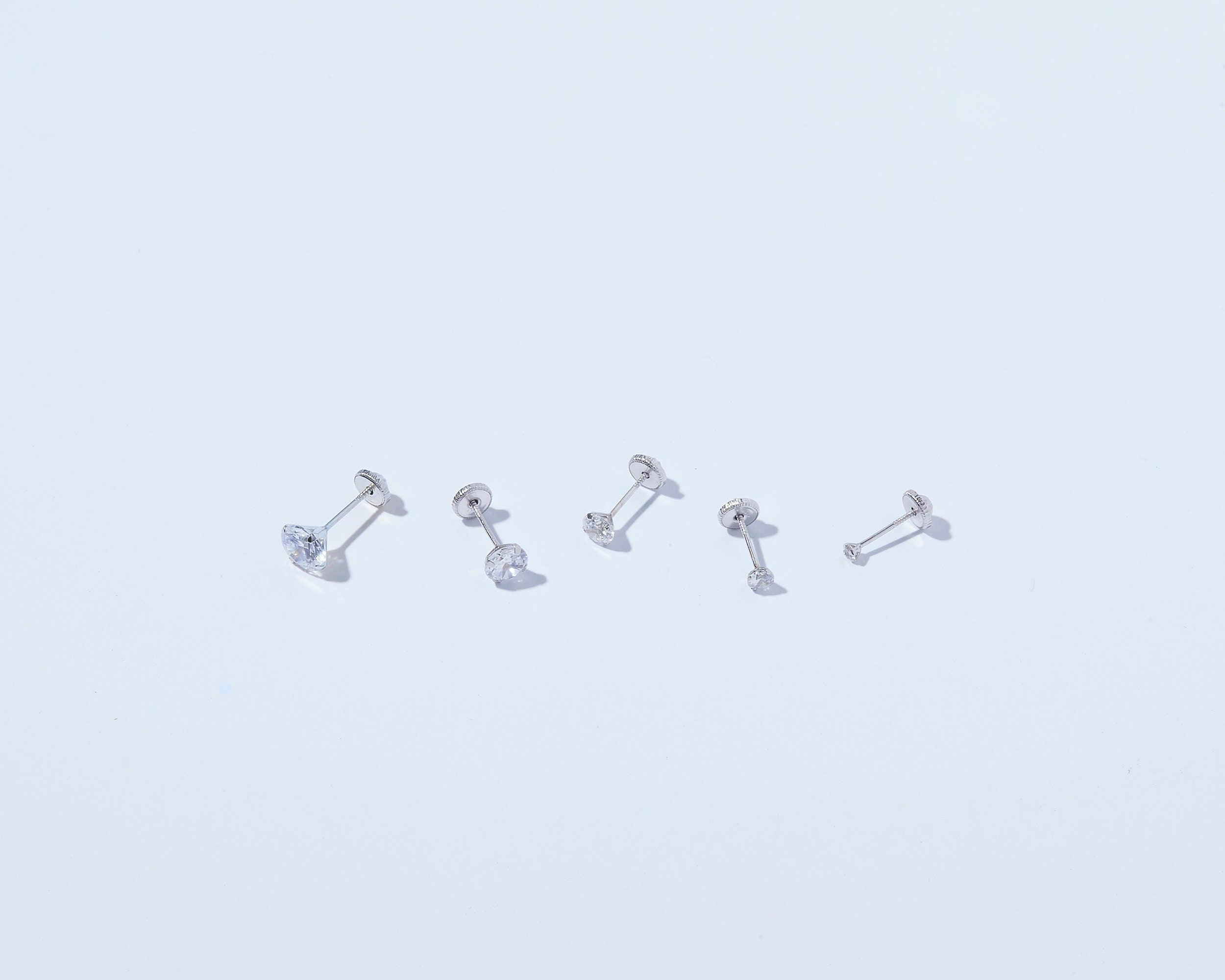 The 14K Solid White Gold Stud Earrings as a daily wear gift in 14K Solid Gold. Hypoallergenic real gold, made for keeping.