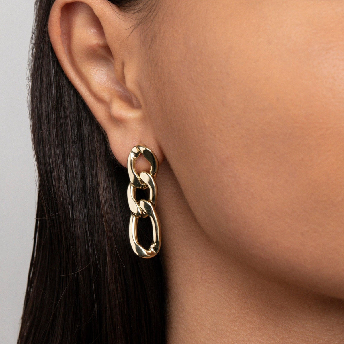 Close detail of the Gold Chain Link Drop Earrings in Gold-Plated Steel. Tarnish-resistant, premium handmade jewelry.