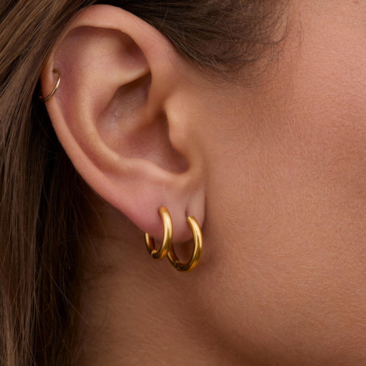 Close detail of the 18K Plated Gold Hoop Earrings Multi Size in Gold-Plated Steel. Tarnish-resistant, premium handmade.