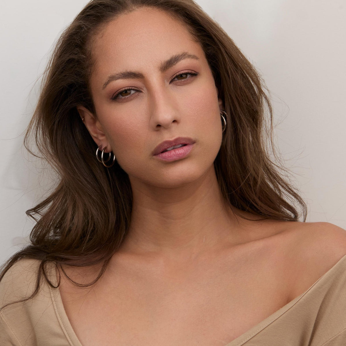 The 18K Plated Gold Hoop Earrings Multi Size worn in Gold-Plated Steel — refined accessory for women. Tarnish-resistant.