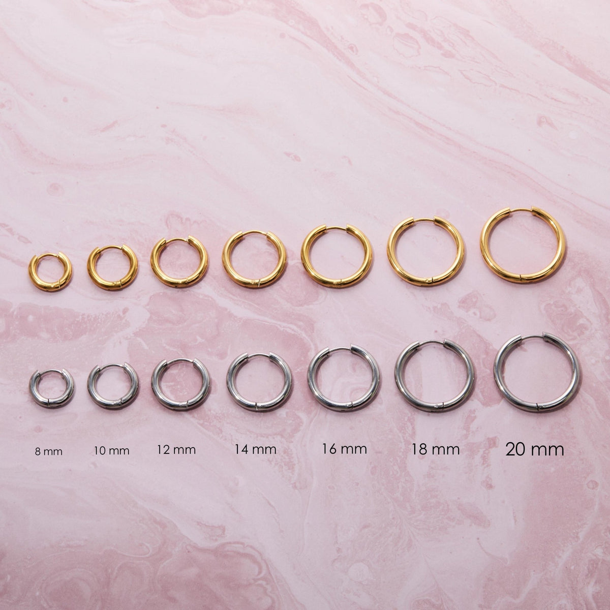 The 18K Plated Gold Hoop Earrings Multi Size styled in Gold-Plated Steel — elegant everyday jewelry. Hypoallergenic.