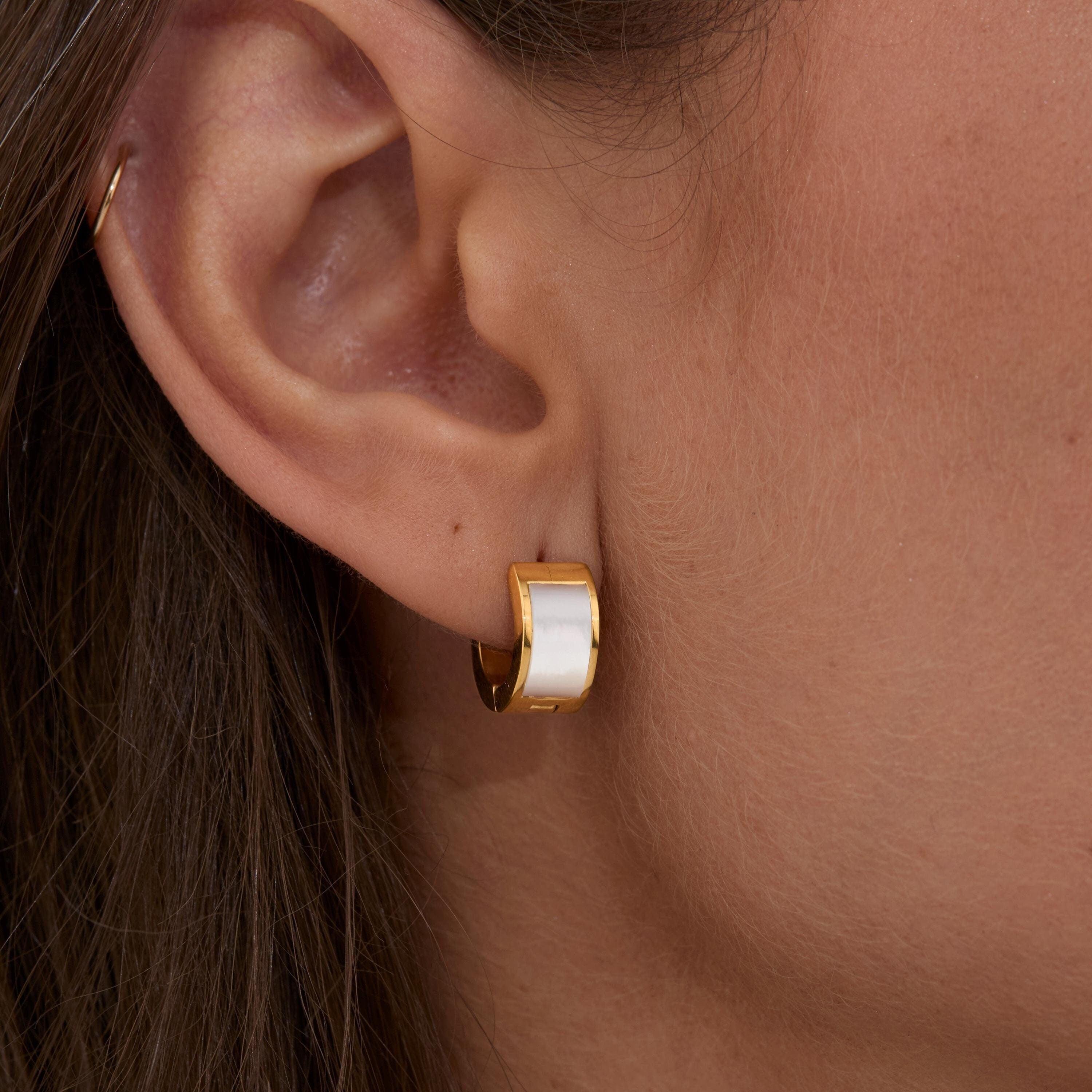 The 18K Gold Plated Mother of Pearl Hoop Earrings styled in Gold-Plated Steel — elegant everyday jewelry. Hypoallergenic.