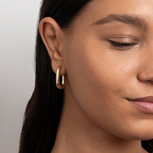 Close detail of the Square Hoop Earrings in Gold-Plated Steel. Tarnish-resistant, premium handmade jewelry.