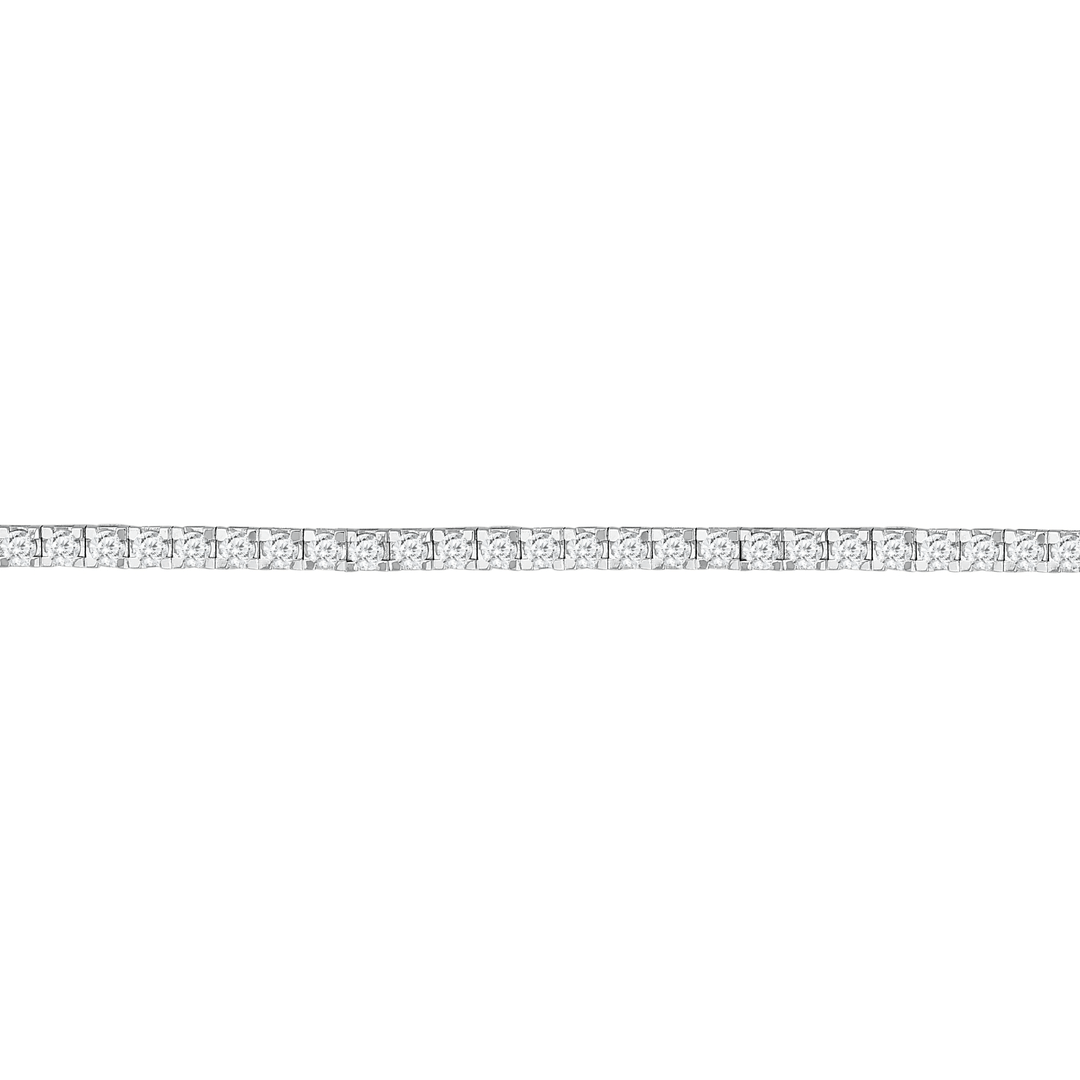 Close view of the square four-claw links of the 14K white gold tennis bracelet, one round natural diamond in each