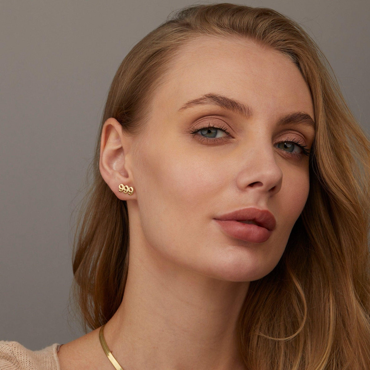 The Angel Number Earrings styled in 18K Gold Vermeil — elegant everyday jewelry. Hypoallergenic for sensitive ears.