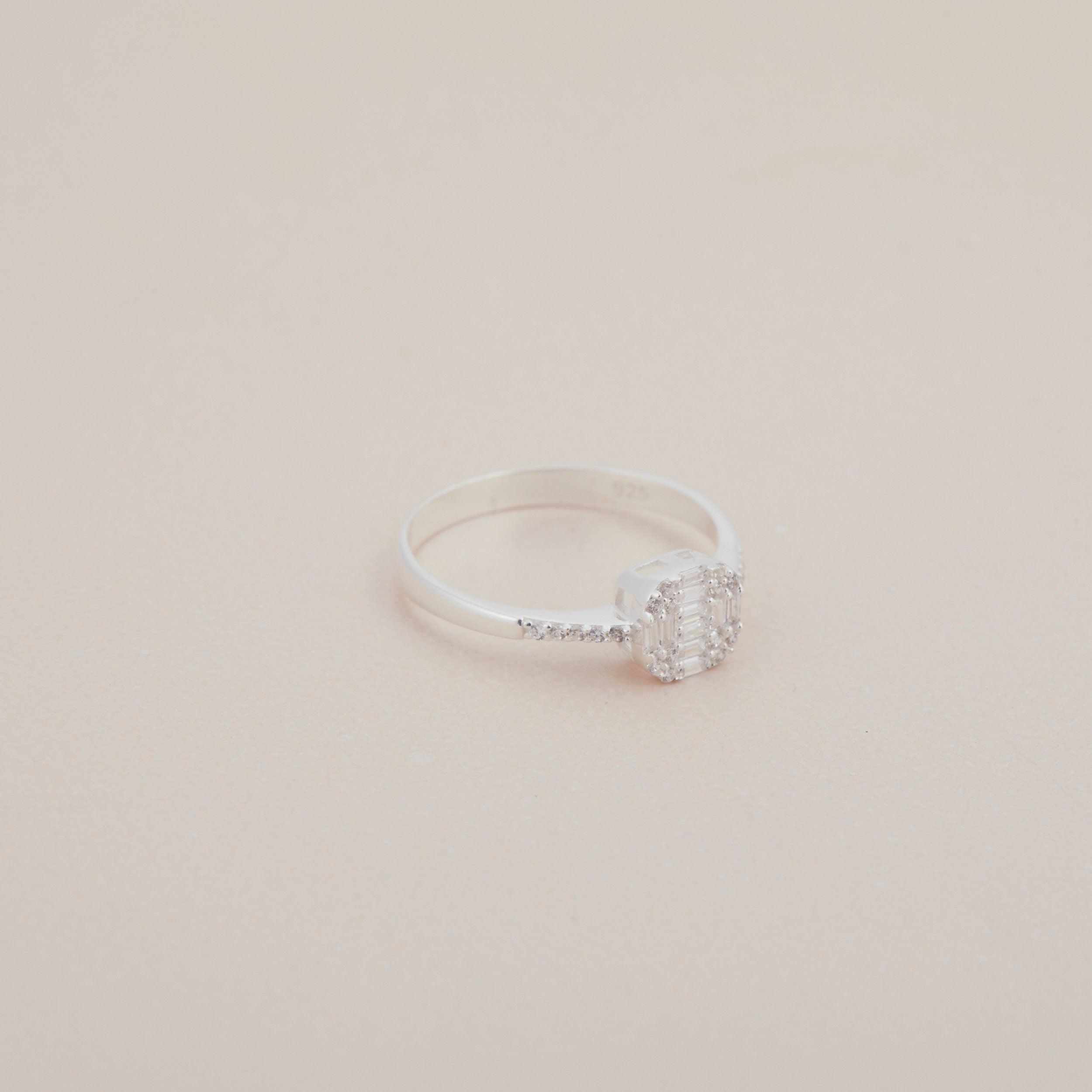 Macro detail of the Baguette Cut Diamond Ring: CZ Diamond set in 18K Gold Vermeil. Tarnish-resistant, handmade jewelry.