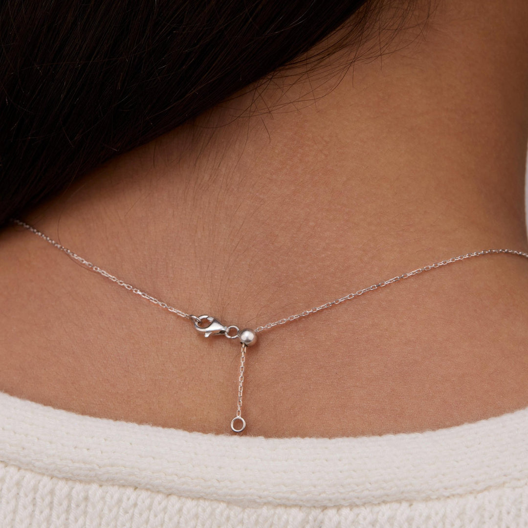 The Birth Flower Necklace styled in 18K Gold Vermeil — elegant everyday jewelry. Hypoallergenic, no green marks.