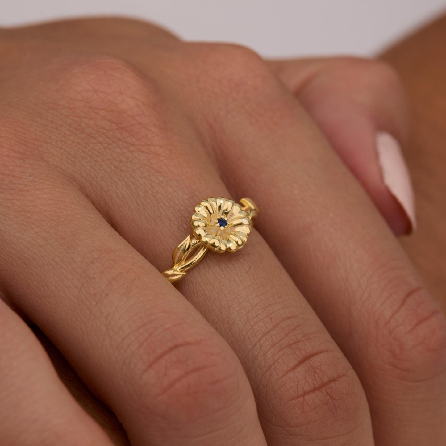 Macro detail of the Birth Flower Ring with Birthstone: Birthstone set in 18K Gold Vermeil. Tarnish-resistant, handmade.