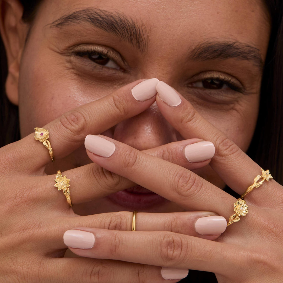 The Birth Flower Ring with Birthstone styled in 18K Gold Vermeil — elegant everyday jewelry. Tarnish-resistant.
