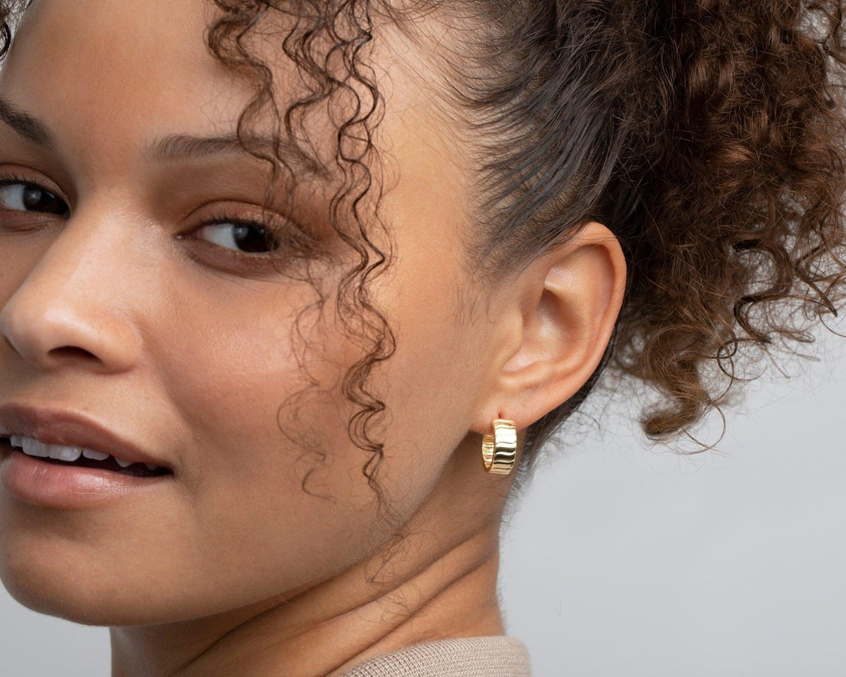 The Bold Hoop Earrings as an anniversary gift in 18K Gold Vermeil. Tarnish-resistant, made for keeping.