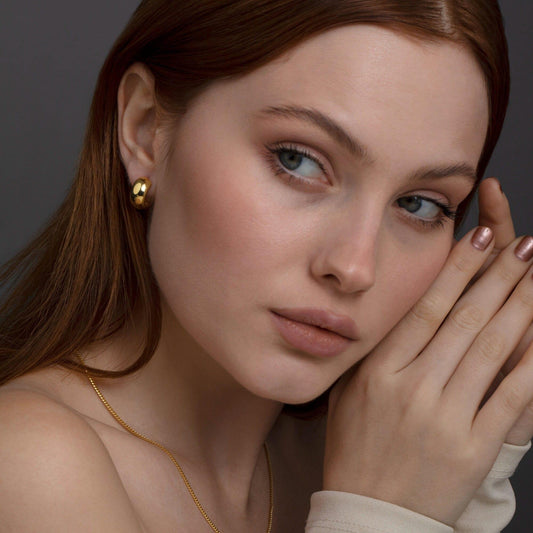 Close detail of the Bold Hinged Huggie Earrings in 18K Gold Vermeil. Tarnish-resistant, premium handmade jewelry.