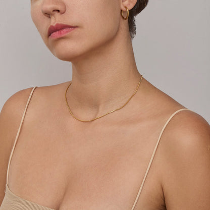 Box Chain Necklace worn with a slip top — 1.3 mm gold chain necklace for women.