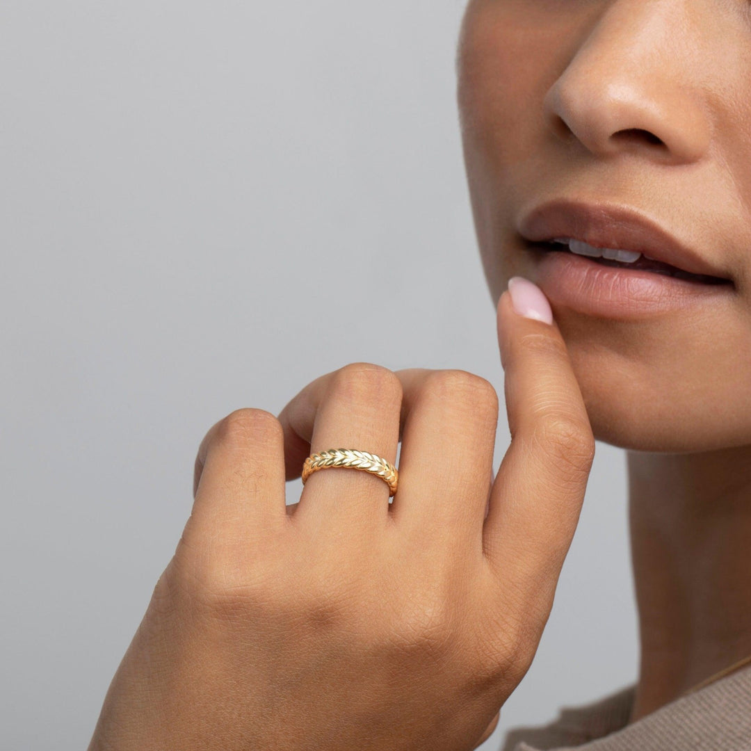 The Braided Band Stackable Ring styled in 18K Gold Vermeil — elegant everyday jewelry. Tarnish-resistant.