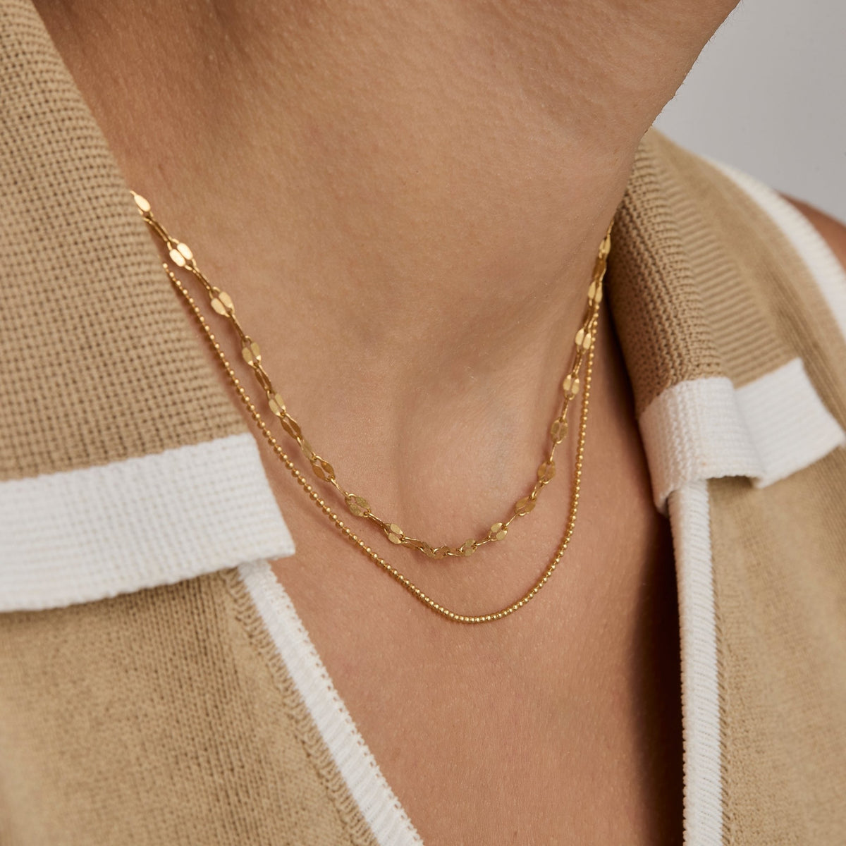 Layered chain necklace look with the gold buc mirror chain