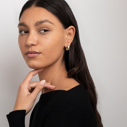 The Chunky CZ Diamond Hoop Earrings as an anniversary gift in Gold-Plated Steel. Tarnish-resistant, made for keeping.