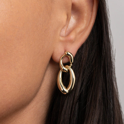 Close detail of the Chunky Link Drop Earrings in Gold-Plated Steel. Tarnish-resistant, premium handmade jewelry.