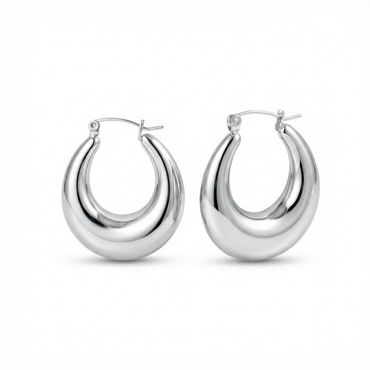 Chunky Silver Hoops in Stainless Steel. Never tarnishes, waterproof, perfect for daily wear.