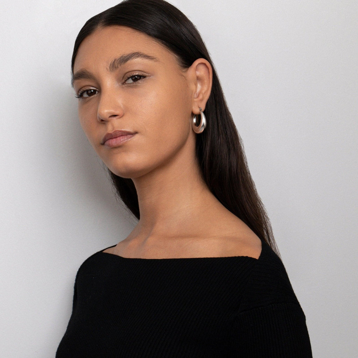 Close detail of the Chunky Silver Hoops in Stainless Steel. Hypoallergenic, tarnish-free, premium handmade jewelry.