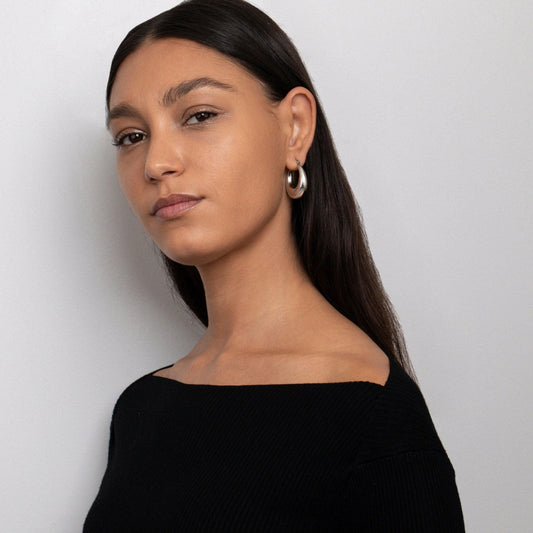 Close detail of the Chunky Silver Hoops in Stainless Steel. Hypoallergenic, tarnish-free, premium handmade jewelry.