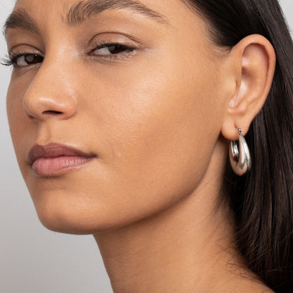 The Chunky Silver Hoops as an anniversary gift in Stainless Steel. Never tarnishes, waterproof, made for keeping.