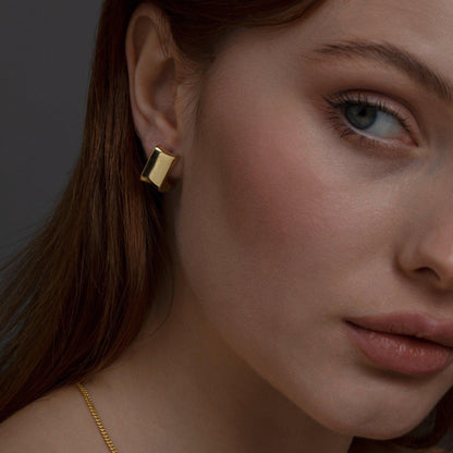 The Chunky Square Huggie Hoop Earrings as a daily wear gift in 18K Gold Vermeil. Tarnish-resistant, made for keeping.