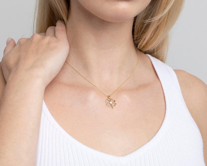 Close detail of the Clover Heart Gold Necklace in 18K Gold Vermeil. Safe for sensitive skin, premium handmade jewelry.