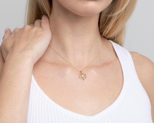 Close detail of the Clover Heart Gold Necklace in 18K Gold Vermeil. Safe for sensitive skin, premium handmade jewelry.
