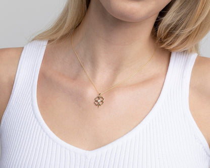 The Clover Heart Gold Necklace as an anniversary gift in 18K Gold Vermeil. Safe for sensitive skin, made for keeping.