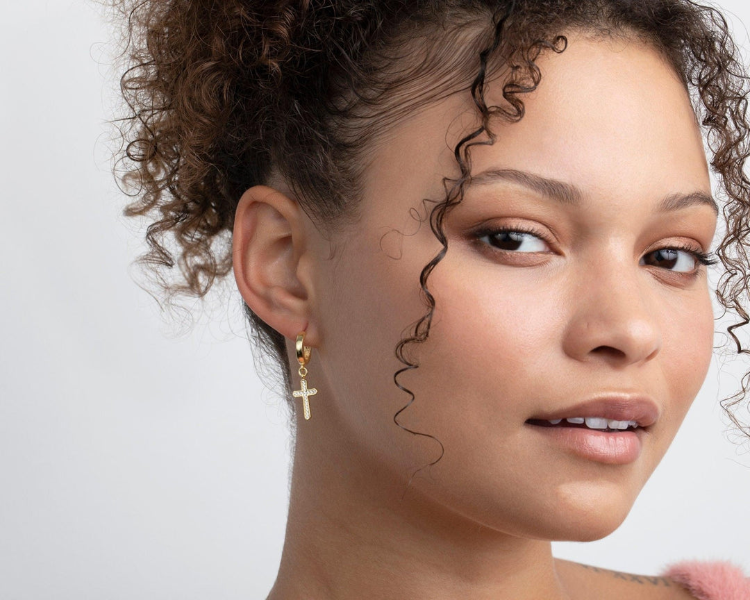 The Cross Hoop Earrings styled in 18K Gold Vermeil — elegant everyday jewelry. Hypoallergenic for sensitive ears.