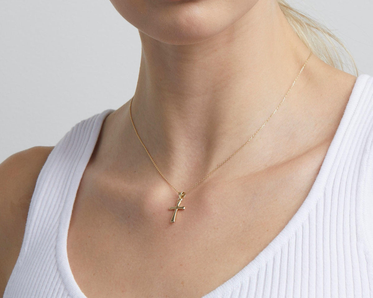 Small Cross Necklace for Women as a thoughtful birthday gift in 18K Gold Vermeil. Hypoallergenic, no green marks.
