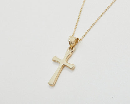 The Small Cross Necklace for Women as a confirmation gift in 18K Gold Vermeil. Safe for sensitive skin, made for keeping.