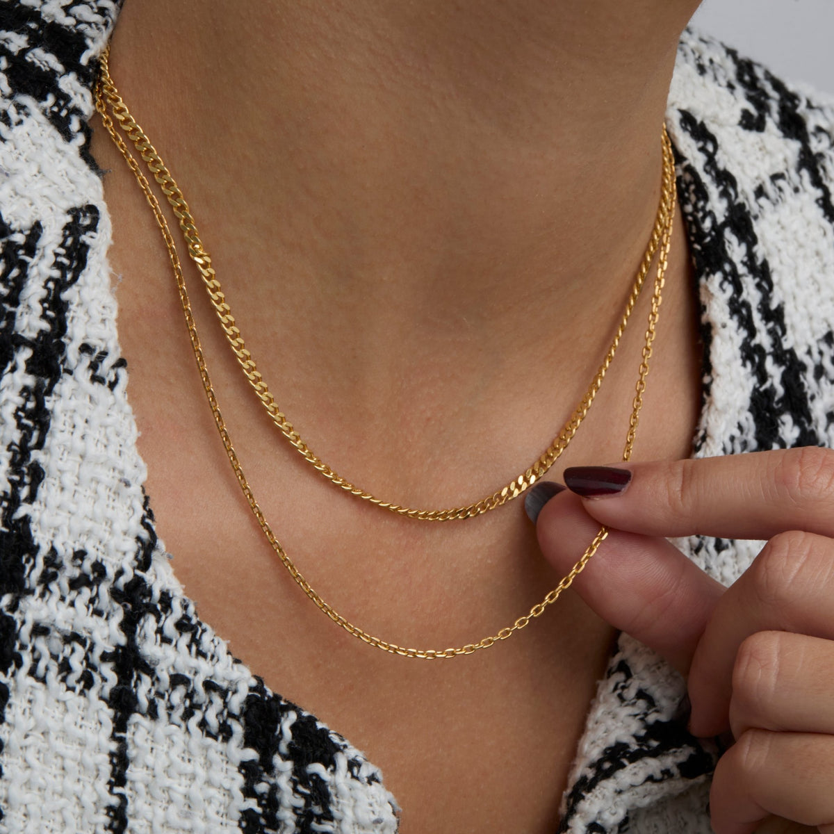 Close up of the 3 mm flat curb links on the gold chain necklace