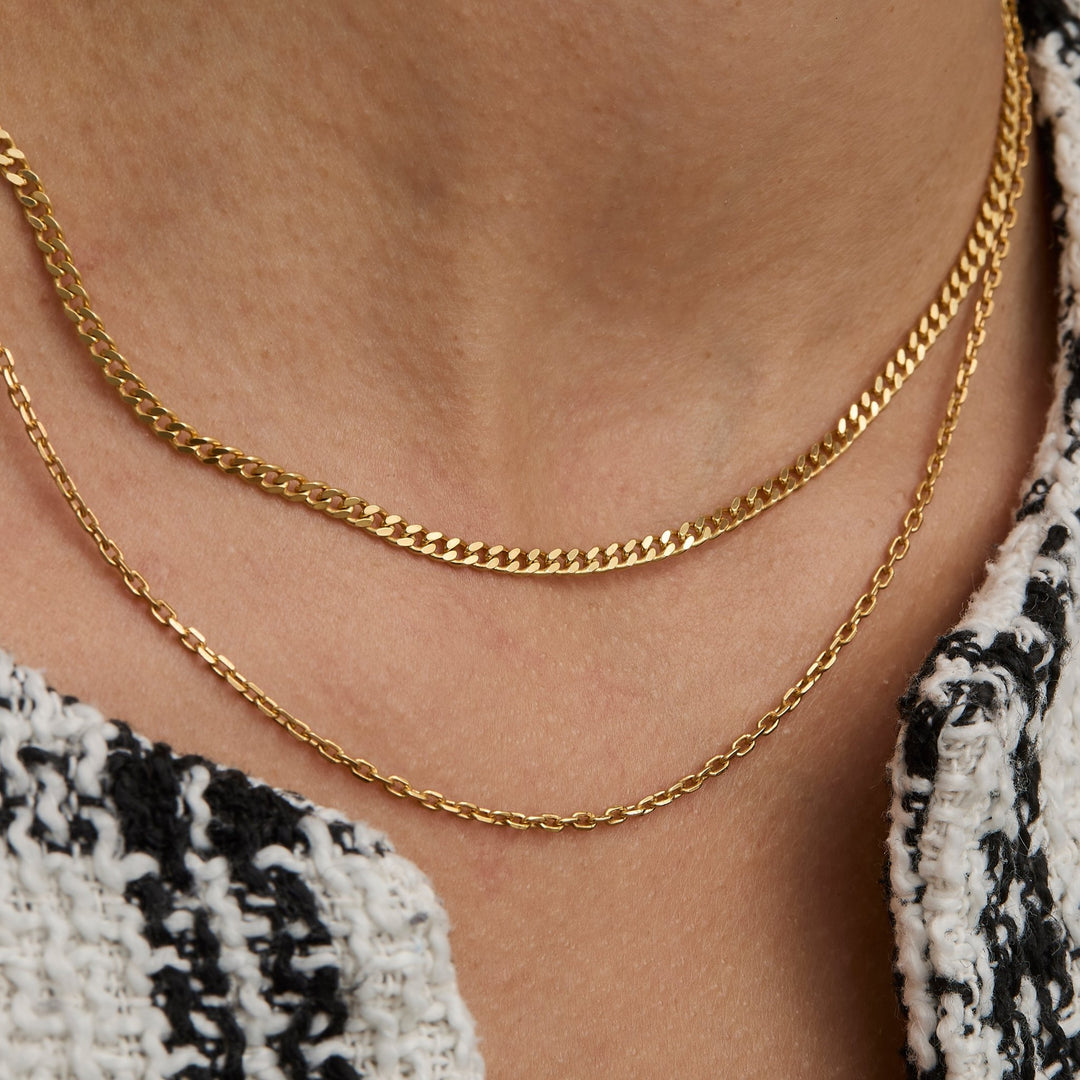 Layered chain necklace look with the gold curb chain