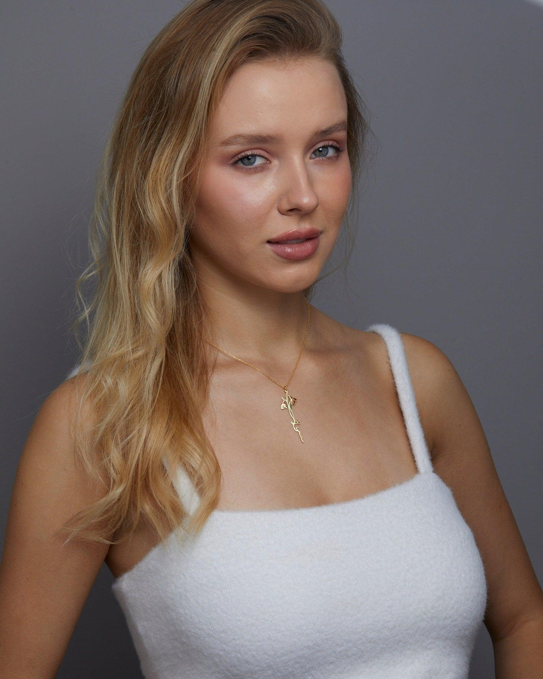 Macro detail of the Custom Birth Flower Name Necklace showcasing craftsmanship in 18K Gold Vermeil. Tarnish-resistant.