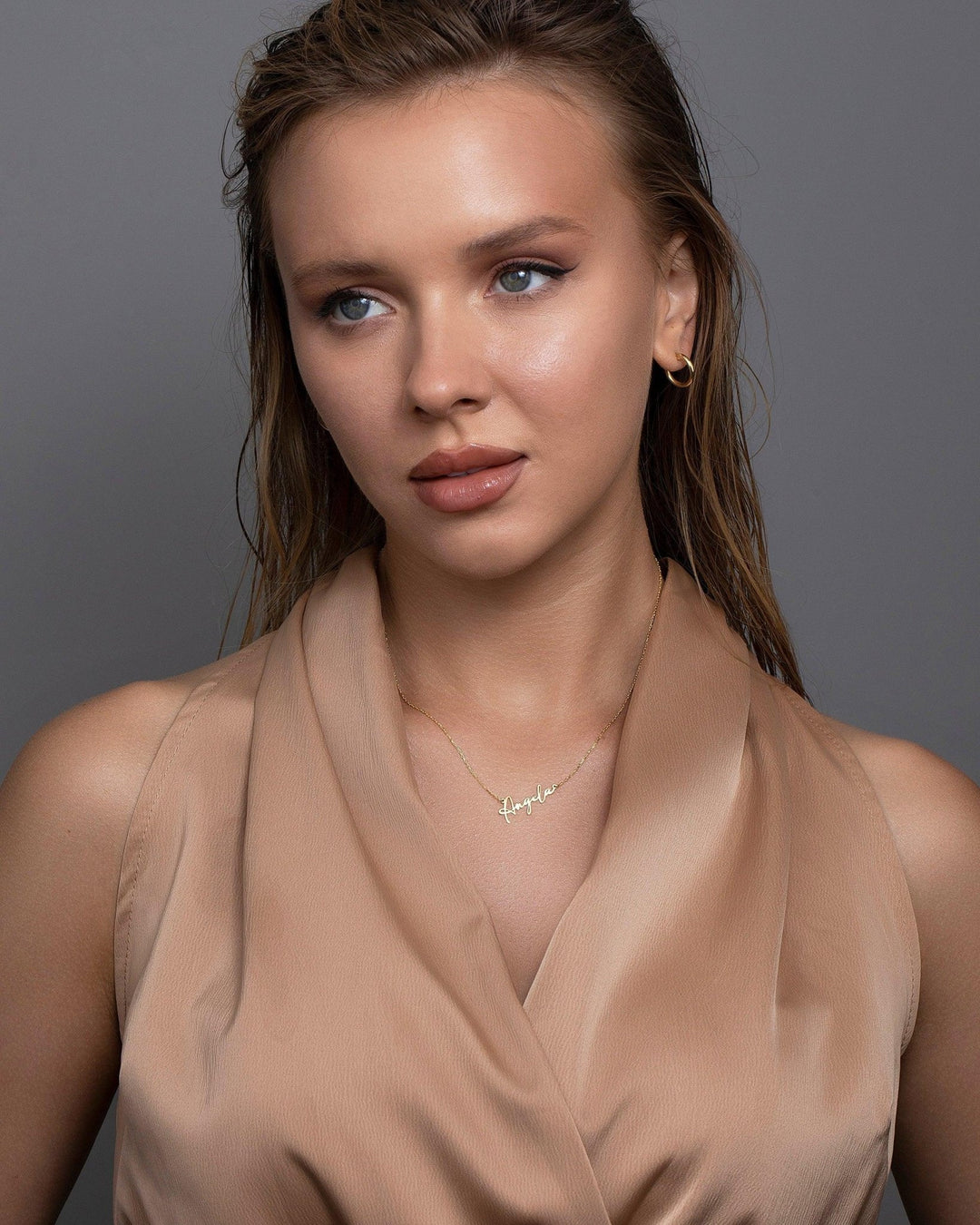 The Custom Name Necklace styled in 18K Gold Vermeil — elegant everyday jewelry. Hypoallergenic, no green marks.