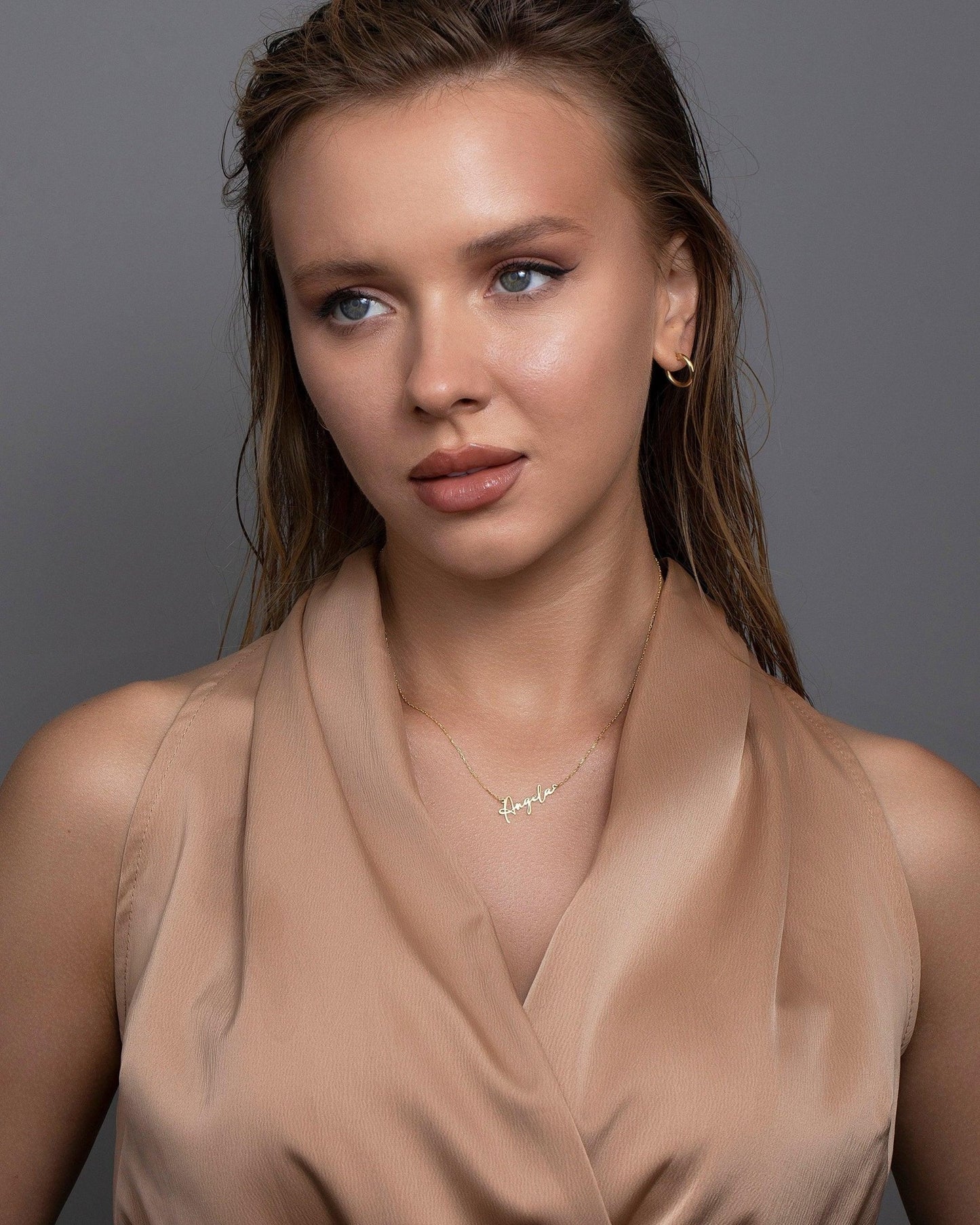 The Custom Name Necklace styled in 18K Gold Vermeil — elegant everyday jewelry. Hypoallergenic, no green marks.
