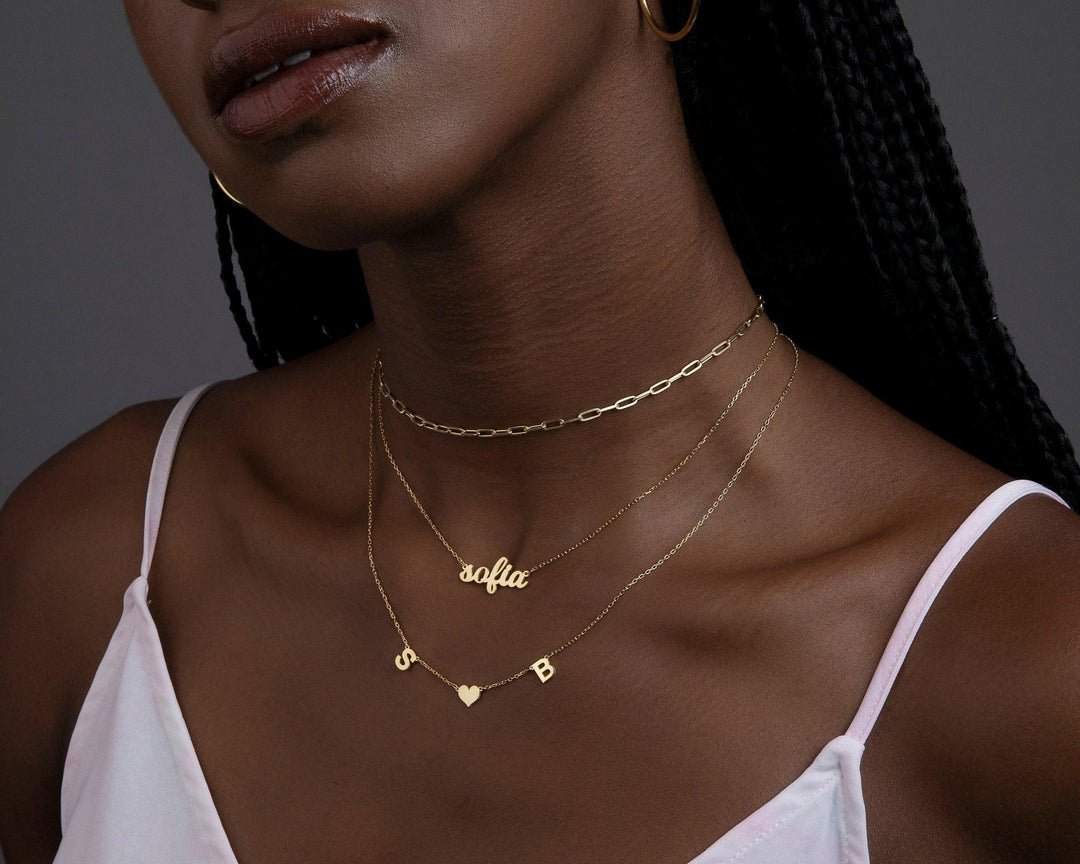 The Custom Name Necklace worn in 18K Gold Vermeil — refined accessory for women. Safe for sensitive skin.