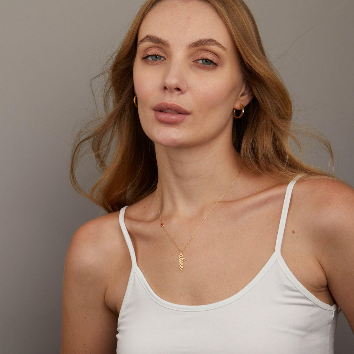 The Custom Name Necklace with Birthstone styled in 18K Gold Vermeil — elegant everyday jewelry. Hypoallergenic, no green.