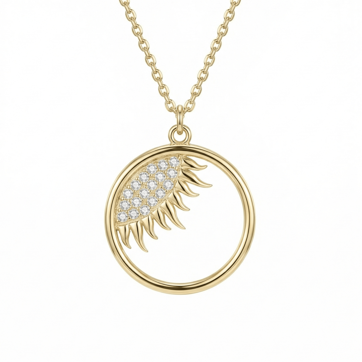 Dainty Evil Eye Sun Necklace in 14K solid gold: an open circle pendant with an almond-shaped eye of 18 clear CZ stones and gold sun rays.