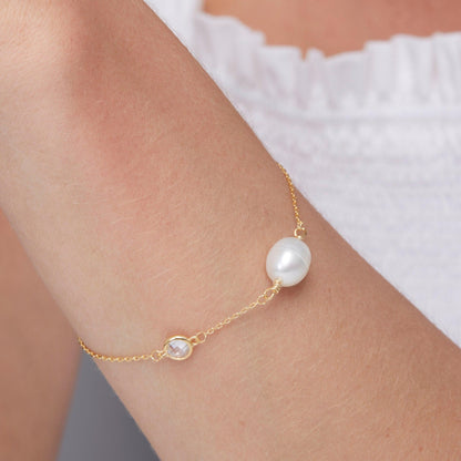 The Dainty Freshwater Pearl Charm Bracelet as a wedding gift in 18K Gold Vermeil. Safe for sensitive skin, made for keeping.
