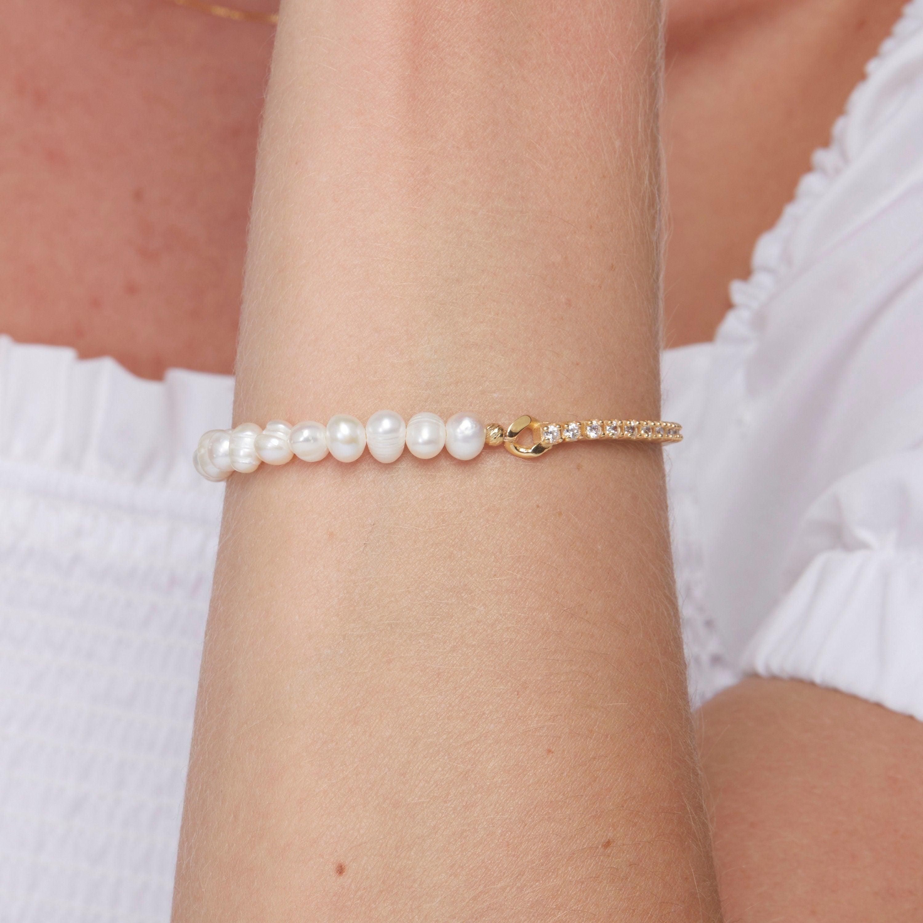 The Dainty Freshwater Pearl Tennis Bracelet styled in 18K Gold Vermeil — elegant everyday jewelry. Hypoallergenic, no green.